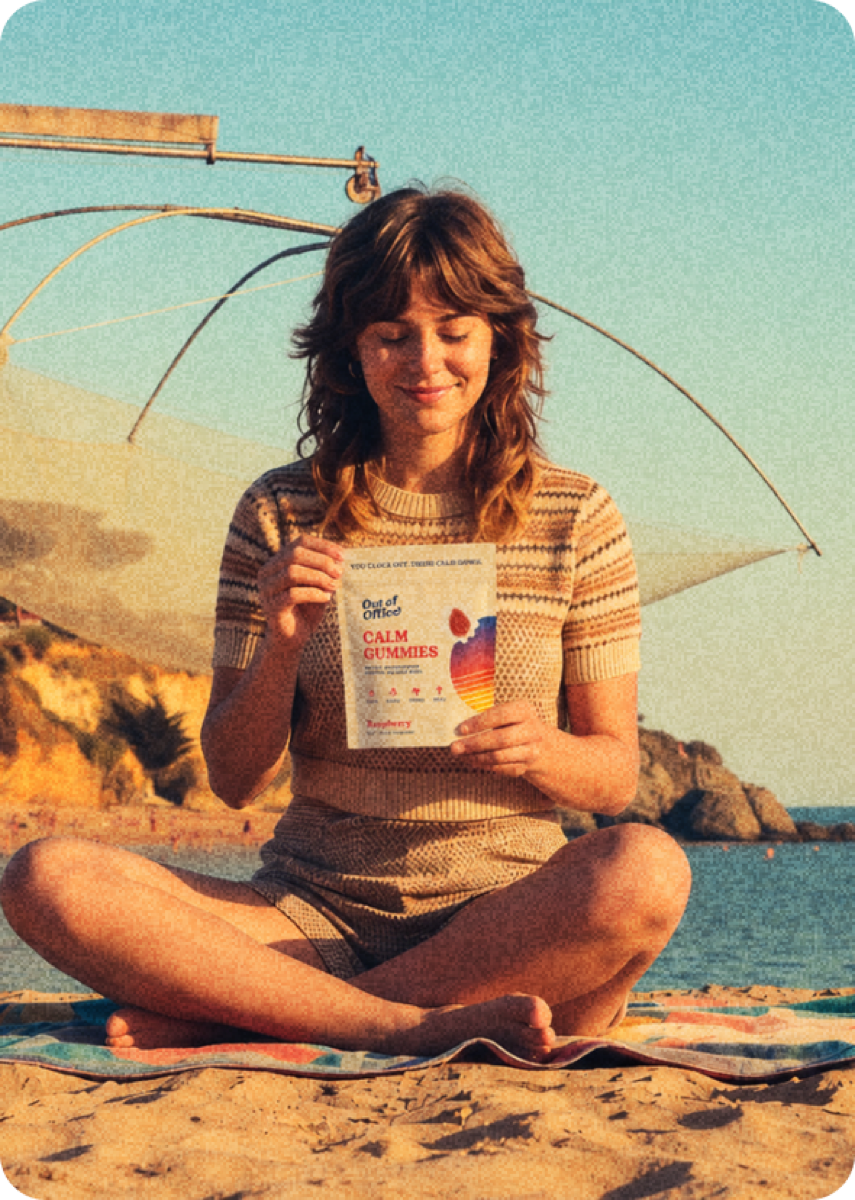 Woman on the beach holding Out of Office Calm