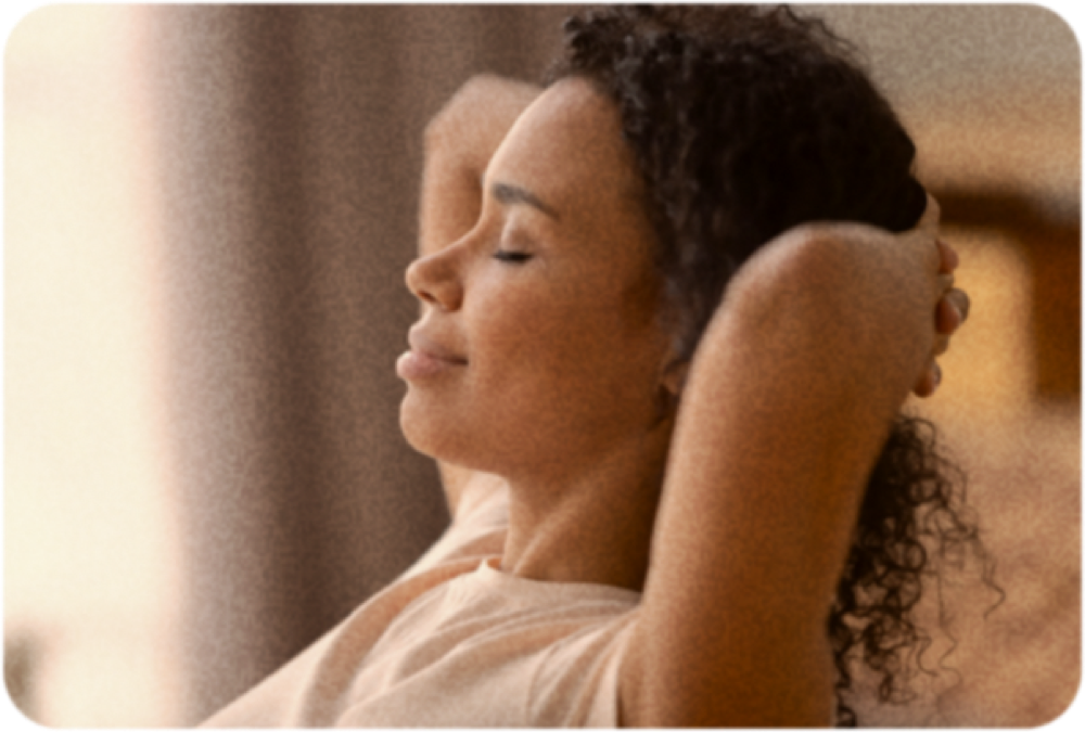 Woman relaxing with eyes closed